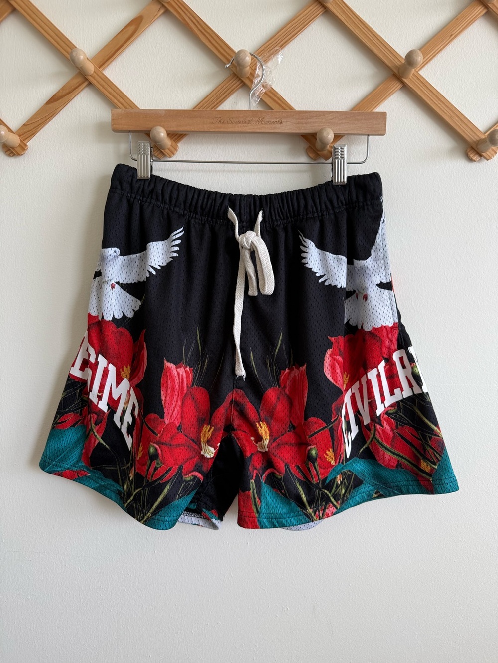 Civil Regime floral mesh shorts
